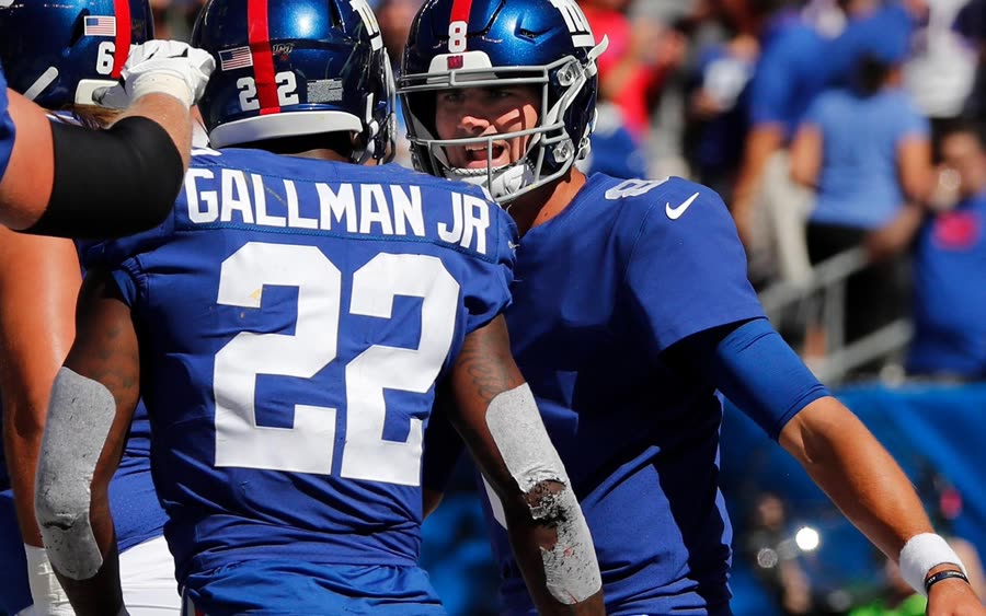 Wayne Gallman celebrating on the sideline